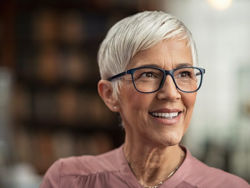Senior woman smiling after visiting Charleston retina doctor